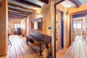 Postel nebo postele na pokoji v ubytování Can Miqueló - casa rural 16 hòstes