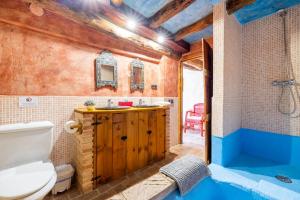 Koupelna v ubytování Can Miqueló - casa rural 16 hòstes