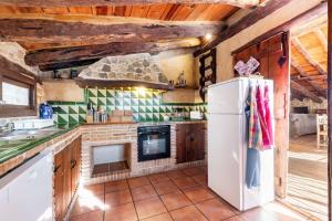 Kuchyň nebo kuchyňský kout v ubytování Can Miqueló - casa rural 16 hòstes