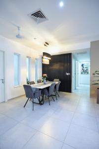 a dining room with a table and chairs at PRIME LINE in Accra