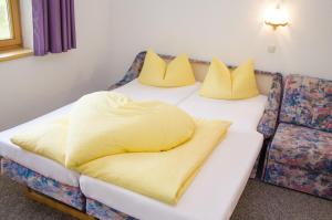 A bed or beds in a room at Pezza Lischa