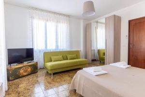 TV a/nebo společenská místnost v ubytování Taormina Matthome