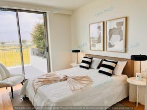 Ένα ή περισσότερα κρεβάτια σε δωμάτιο στο Ocean Beach Apartment - 4 pax - swimming pool