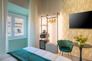 TV a/nebo společenská místnost v ubytování New Morpheus Rooms