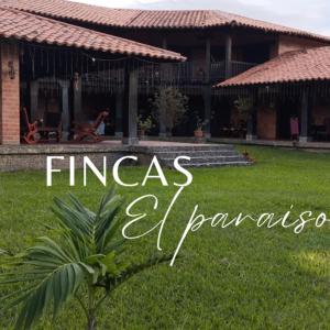 a house with the words fireas el ingeniosos in front of it at Finca el hato in Palmira