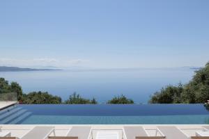 Φωτογραφία από το άλμπουμ του AGNI DREAM Villa luxe face à la mer à Corfou σε Κέντρωμα