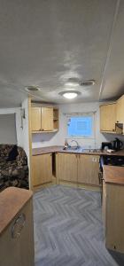 A kitchen or kitchenette at Summer Breeze - Family Holiday home in Camber Sands