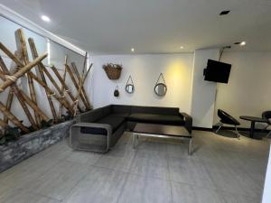 TV a/nebo společenská místnost v ubytování Hotel 47 Medellin Center