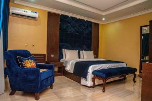 A bed or beds in a room at Otk's Apartment
