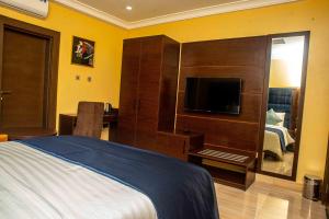 A television and/or entertainment centre at Otk's Apartment