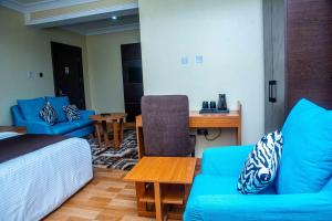 A seating area at Otk's Apartment