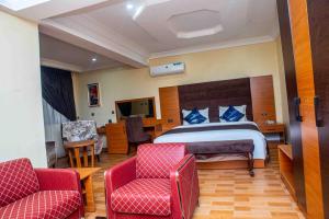 A bed or beds in a room at Otk's Apartment