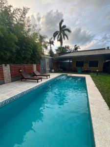 Swimmingpoolen hos eller tæt på Casa en Paso de la Patria