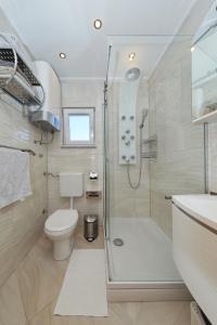 Kúpeľňa v ubytovaní Apartman Sipina 2