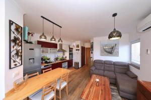 Kuchyňa alebo kuchynka v ubytovaní Apartman Sipina 2
