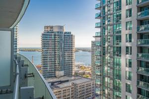 a view of a city with tall buildings at Downtown Apartments 18 in Toronto