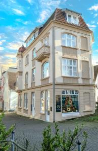 a large white building with a window at Boutique Hotel in Bad Salzuflen