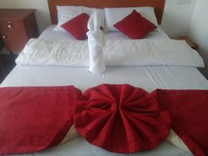 Katil atau katil-katil dalam bilik di T-More Hotel & Hostel