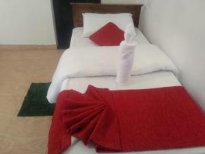 Katil atau katil-katil dalam bilik di T-More Hotel & Hostel
