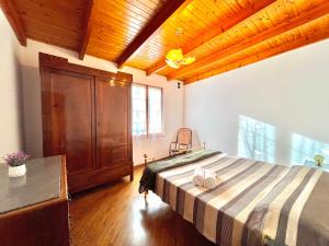 Postel nebo postele na pokoji v ubytování Il Corbezzolo