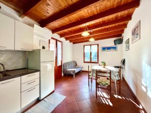 Kuchyň nebo kuchyňský kout v ubytování Il Corbezzolo