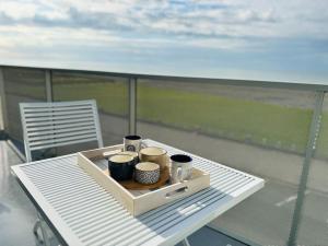 Balkón nebo terasa v ubytování Face à la mer immense
