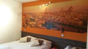Posteľ alebo postele v izbe v ubytovaní Hotel Nuova Orchidea