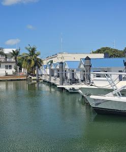a boat docked at a dock in a marina at Yacht Haven in Marathon
