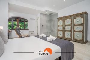 Voodi või voodid majutusasutuse #213 Vila Roja Pé by Home Holidays toas