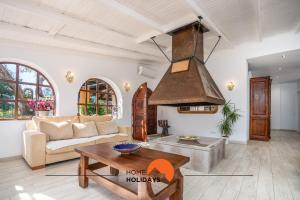 Istumisnurk majutusasutuses #213 Vila Roja Pé by Home Holidays