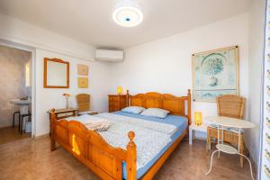 Strandfinca Cala Romantica tesisinde bir odada yatak veya yataklar