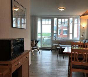 TV a/nebo společenská místnost v ubytování de Linn