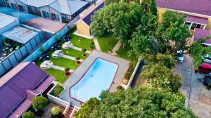 an overhead view of a swimming pool in a yard at Ditoro Boutique Hotel in Pretoria