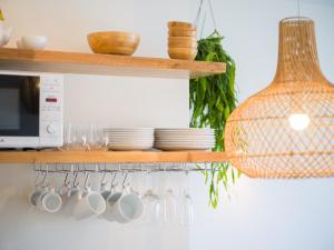 Kuchyň nebo kuchyňský kout v ubytování Apartamento MOJO a 100mts de la playa de Corralejo + 22 fotografií