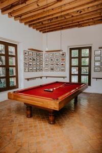 a ping pong table in a room with at Hotel Casa De Quino in Querétaro