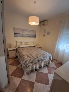 Posteľ alebo postele v izbe v ubytovaní Casa la Viña- ALQUILER FAMILIAS Y PAREJAS