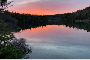 a view of a lake at sunset at Beach Bliss, Great View in Guysborough +7 photos