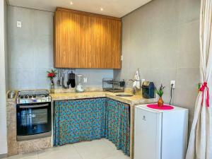 Kuchyň nebo kuchyňský kout v ubytování Loft Maruê Porto de Pedras + 5 fotografií