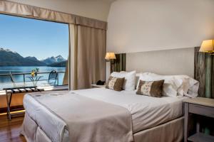 Postel nebo postele na pokoji v ubytování Sol Arrayan Hotel & Spa