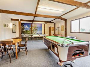 a room with a pool table and a table at 2 bed in Woolacombe 57907 in West Down