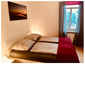 Postel nebo postele na pokoji v ubytování Ferienwohnung Tiffy