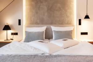 Postel nebo postele na pokoji v ubytování Flair Hotel Werbetal