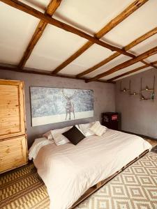 Katil atau katil-katil dalam bilik di Finca Montmagica