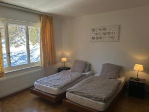 Giường trong phòng chung tại Sorecrans