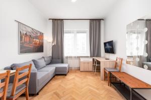 Et opholdsområde på Apartamenty Wawa Centrum by Your Freedom