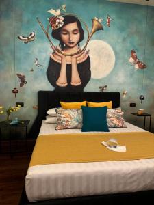 מיטה או מיטות בחדר ב-Pantheon Roma Suite