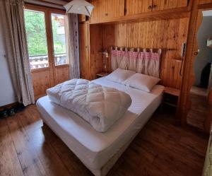 Postel nebo postele na pokoji v ubytování GRANDE CASSE