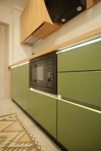 Η κουζίνα ή μικρή κουζίνα στο Green Studio