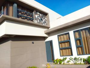 una rappresentazione di una casa di Palms Haven - Mauritius - Modern and luxury vacation home a Phoenix
