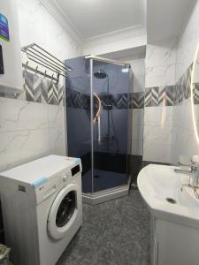 Photo de la galerie de l'établissement Комфортная квартира с видом на горы, à Bishkek